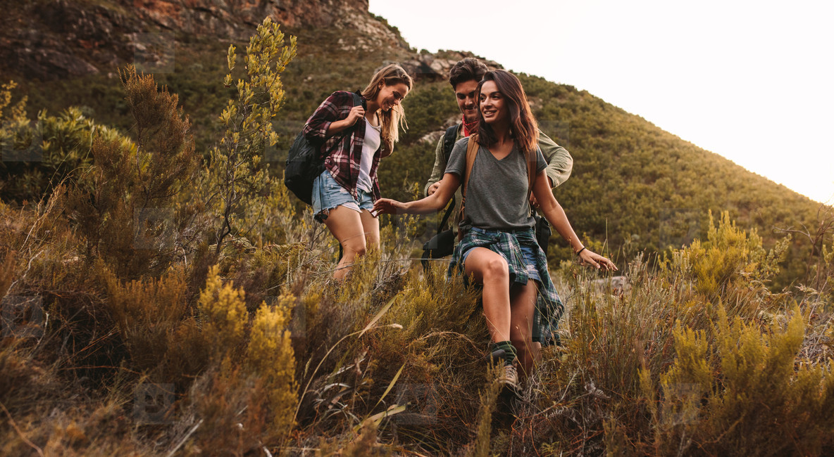 Young adults hiking together